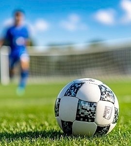 https://ahqafmedia.com/public/uploads/images/newsimages/maannewsimage18022026_164317_pngtree-closeup-of-a-soccer-ball-on-field-and-a-soccer-player-image_16536616.jpg